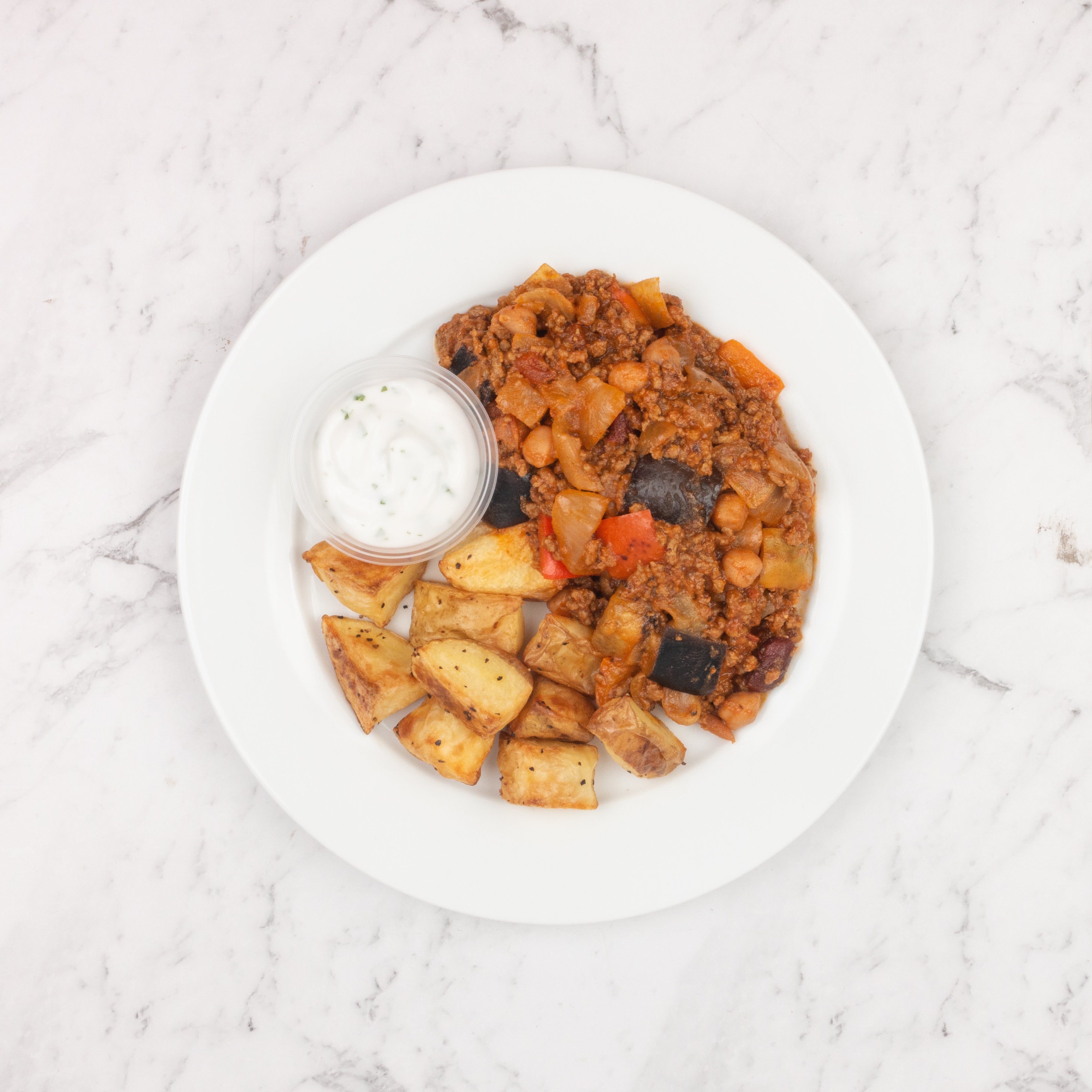 Spiced Beef with Roast Potatoes and Yogurt Sauce
