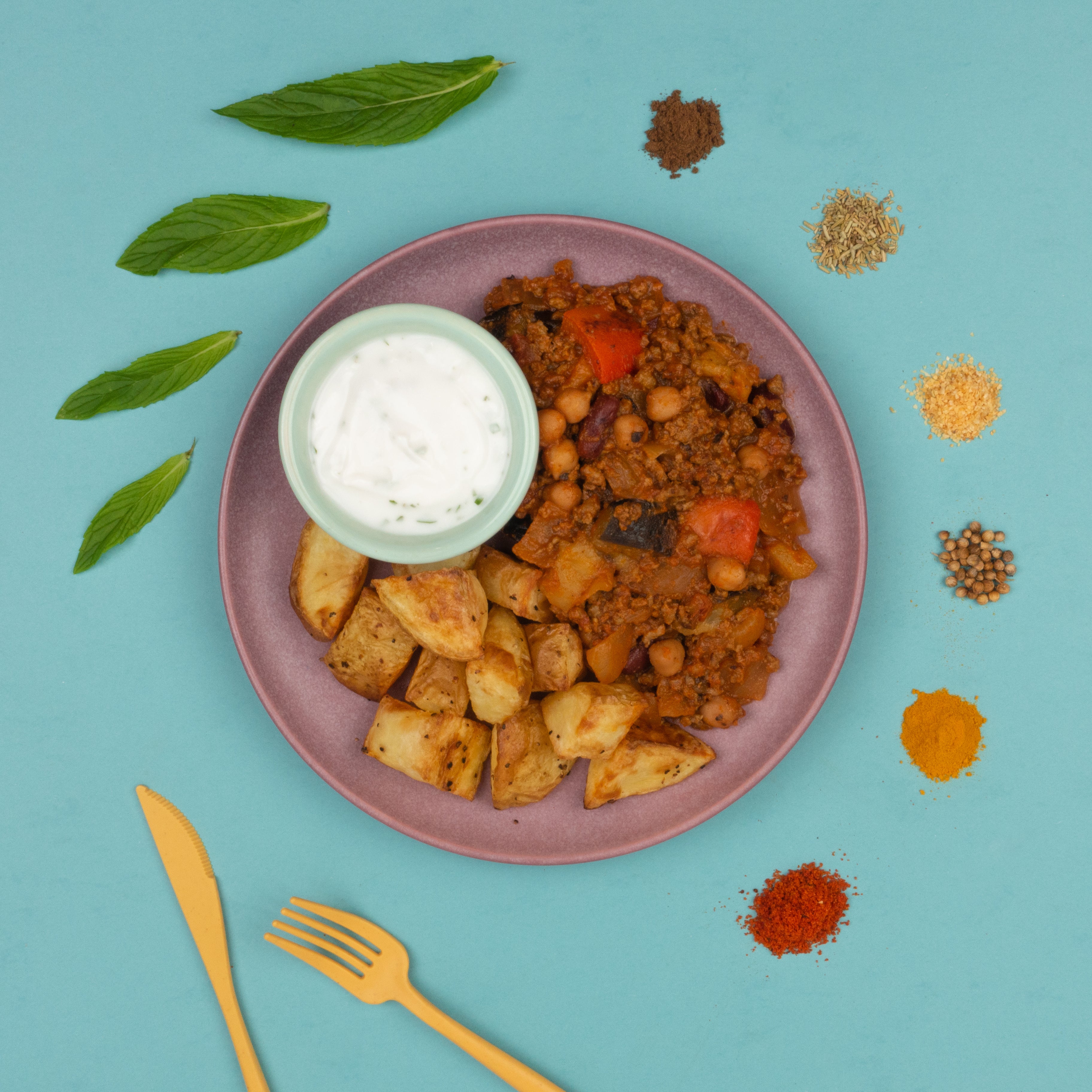 Spiced Beef with Roast Potatoes and Yogurt Sauce